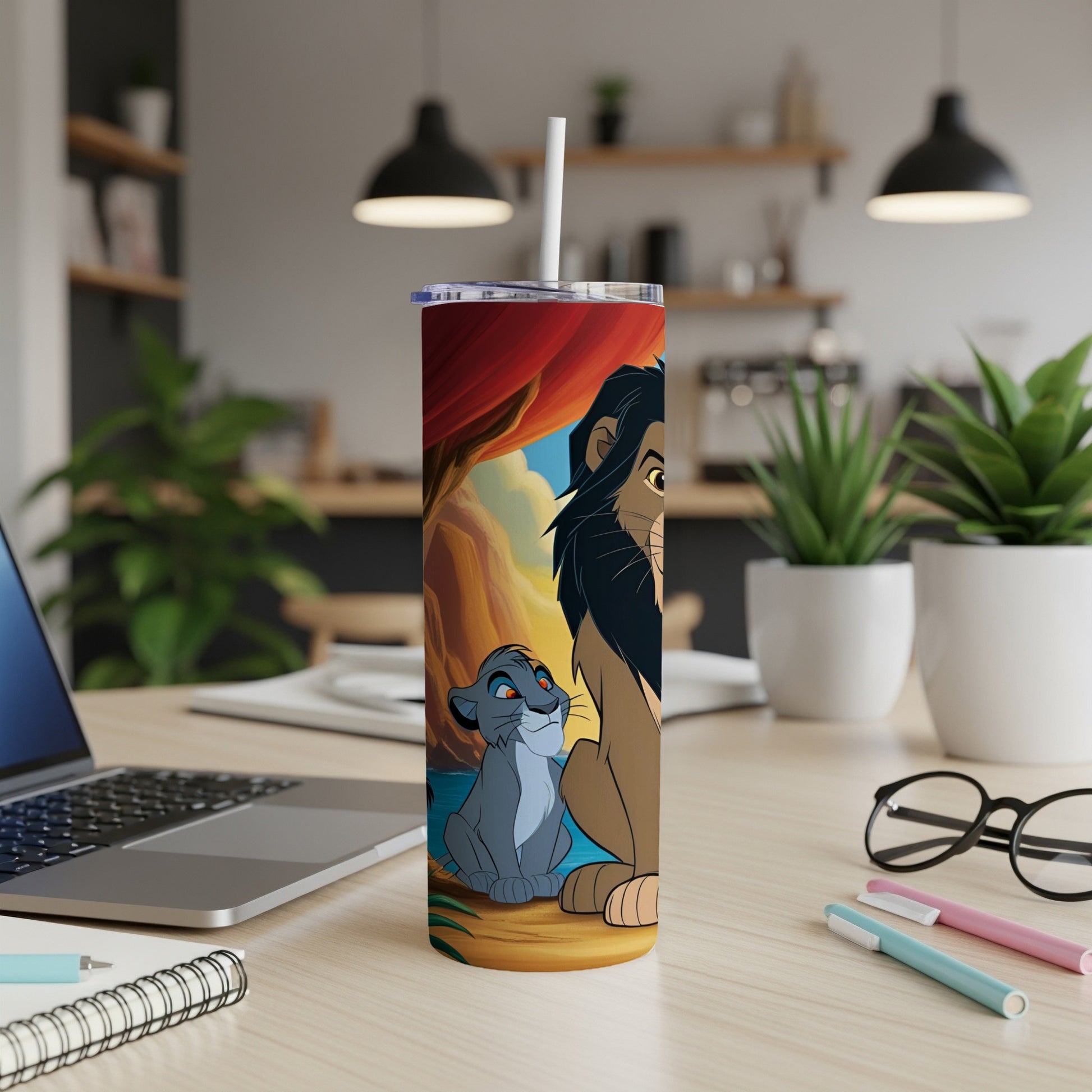 Scar and young Simba lions on a tumbler with a straw in a home office setting.