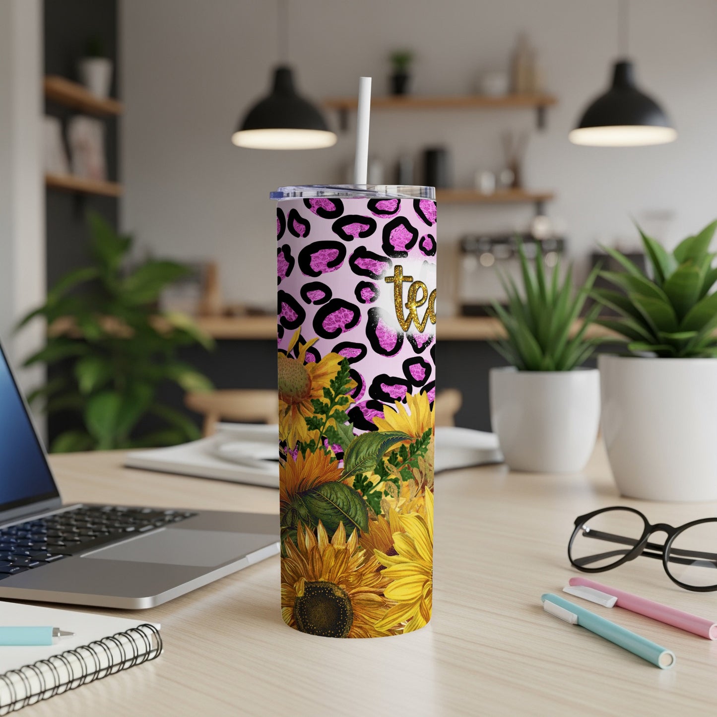Pink leopard print tumbler with sunflowers and "Team" text.
