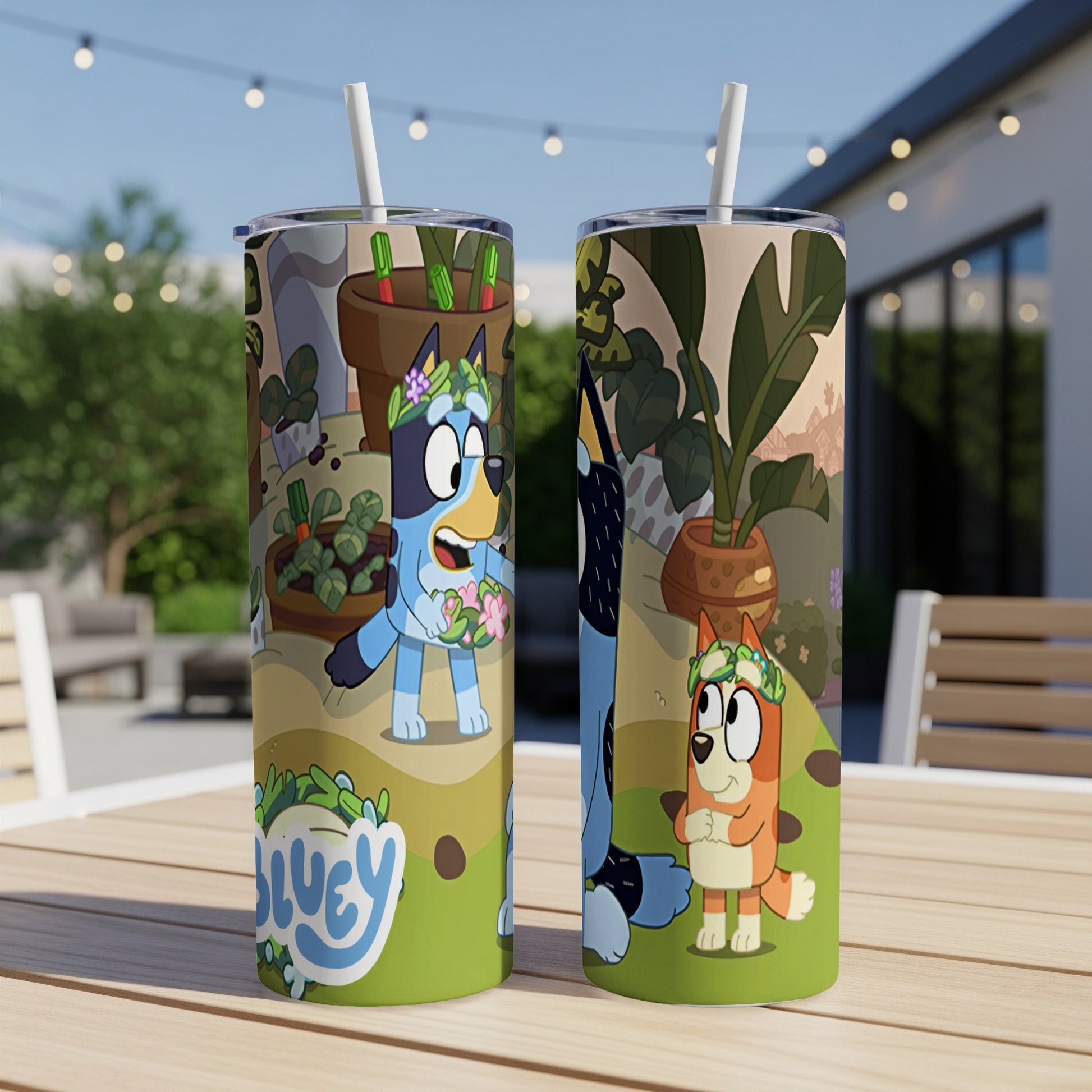 Two Bluey character tumblers with straw and floral accents.