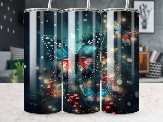 Butterfly and berry design on a cylindrical tumbler with straws.