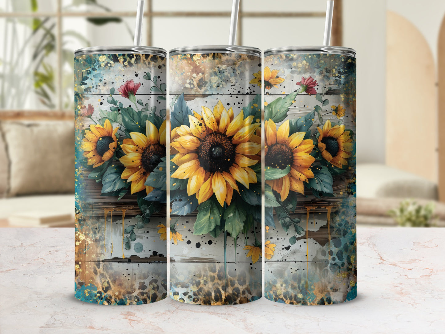 Three tumblers with sunflowers, wood grain, and abstract splatters.