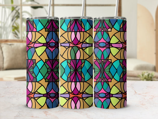 Three colorful stained-glass pattern tumblers on a marble surface.
