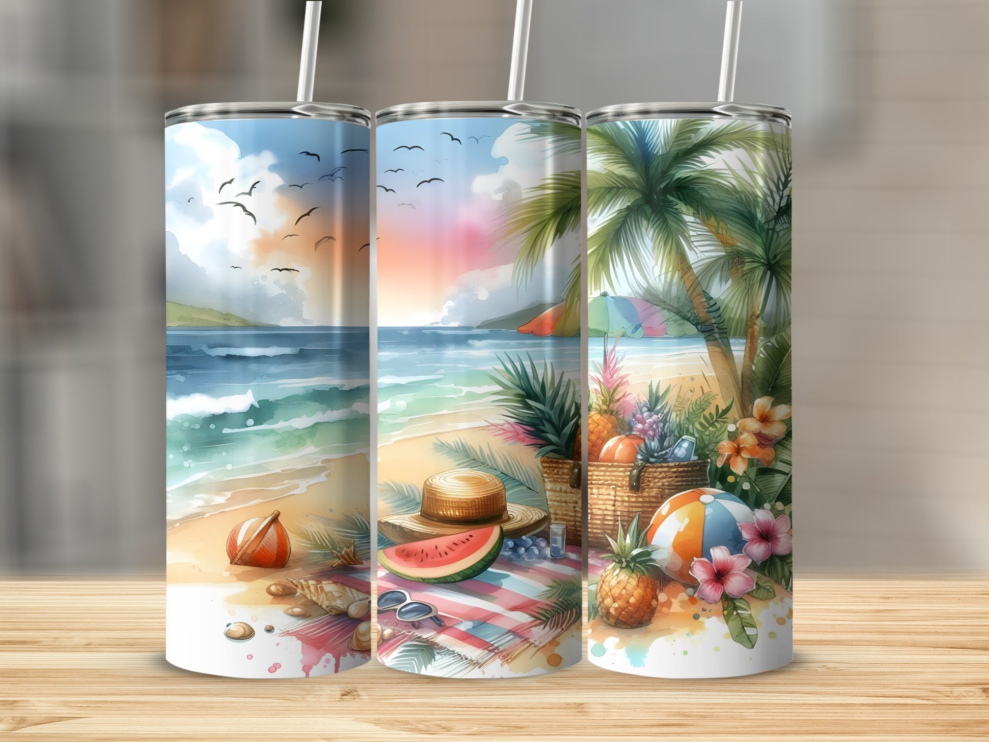 Three tumblers with beach scenes and tropical elements.