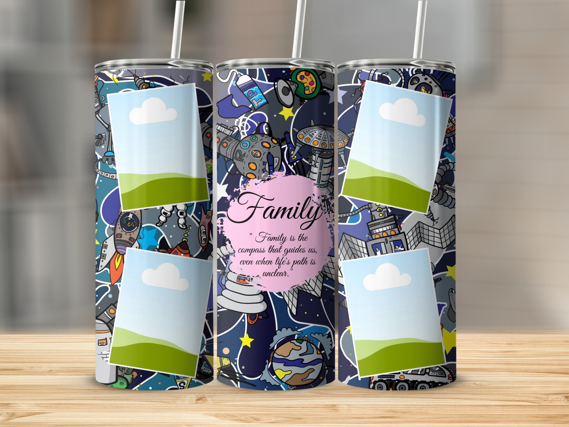 Three tumblers with a space and robot design, featuring photo frames and the quote "Family is the compass".