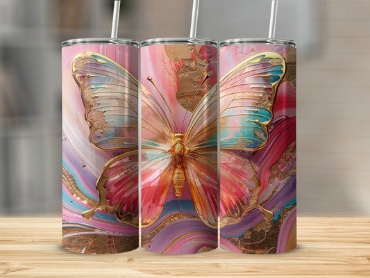 Pink and gold butterfly tumbler with marbled abstract background.