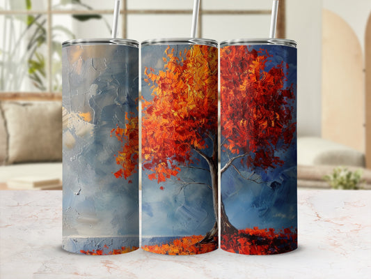 Three tumblers featuring a vibrant autumn tree with red and orange leaves.