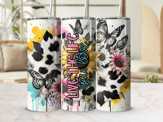 Collage of three tumblers with cow print, sunflowers, butterflies, and "Live The Life You Love" text.