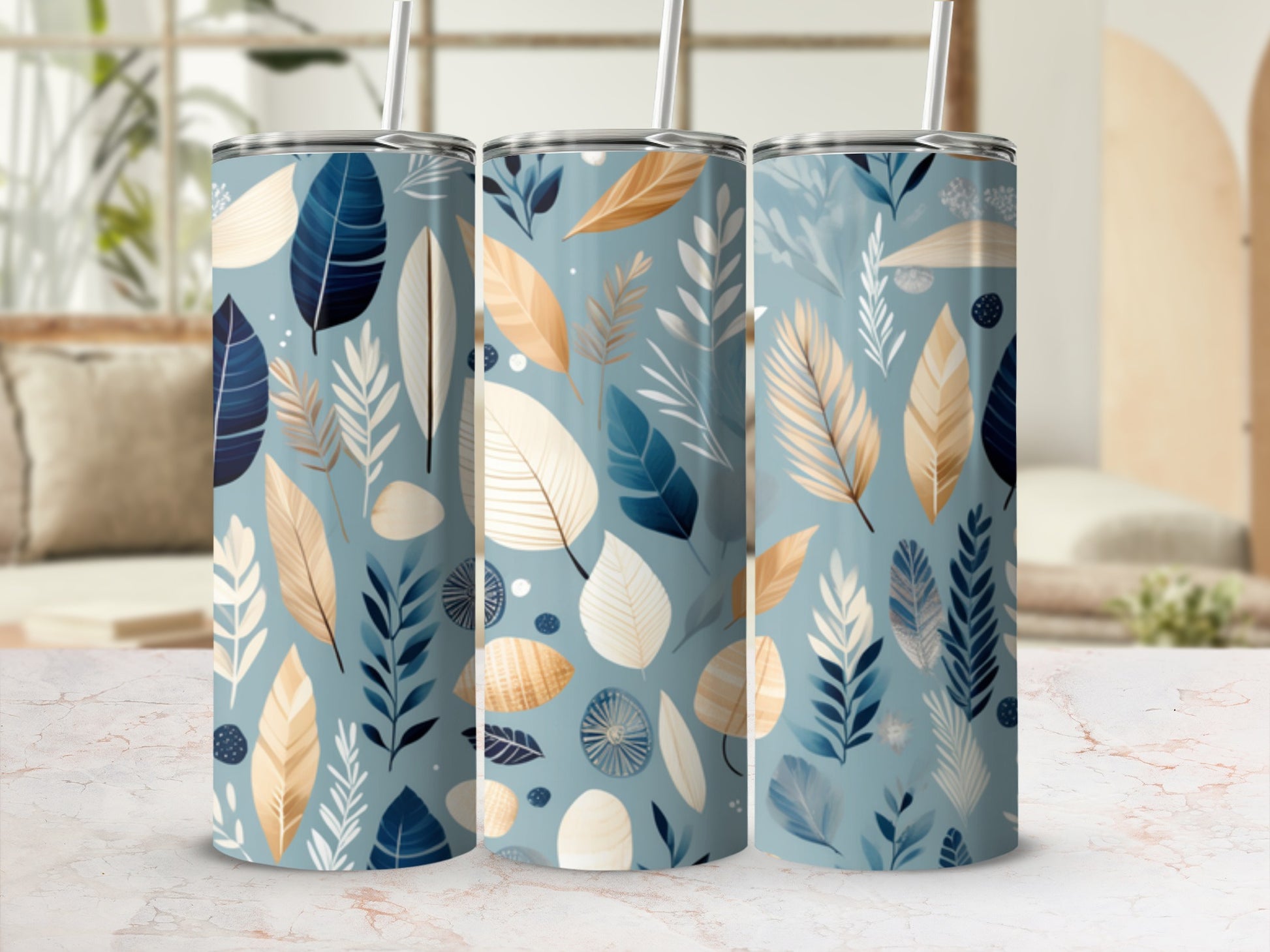 Three tumblers with a blue and cream floral leaf pattern.