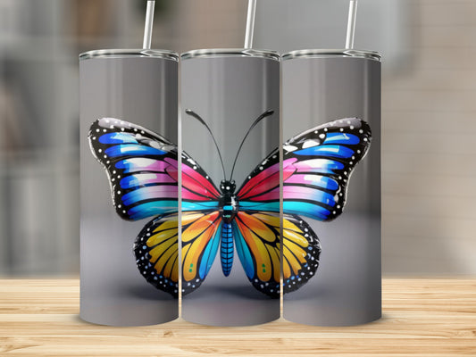 Three tumblers featuring a colorful butterfly design.