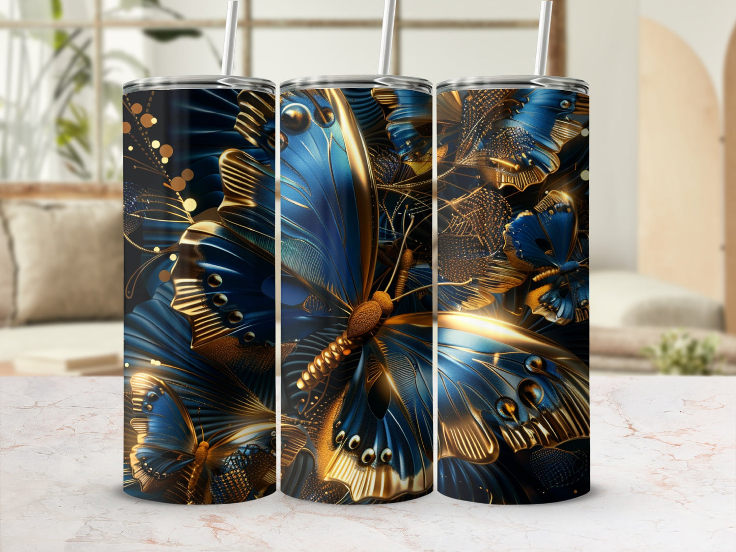 Three tumblers with blue and gold butterfly design.
