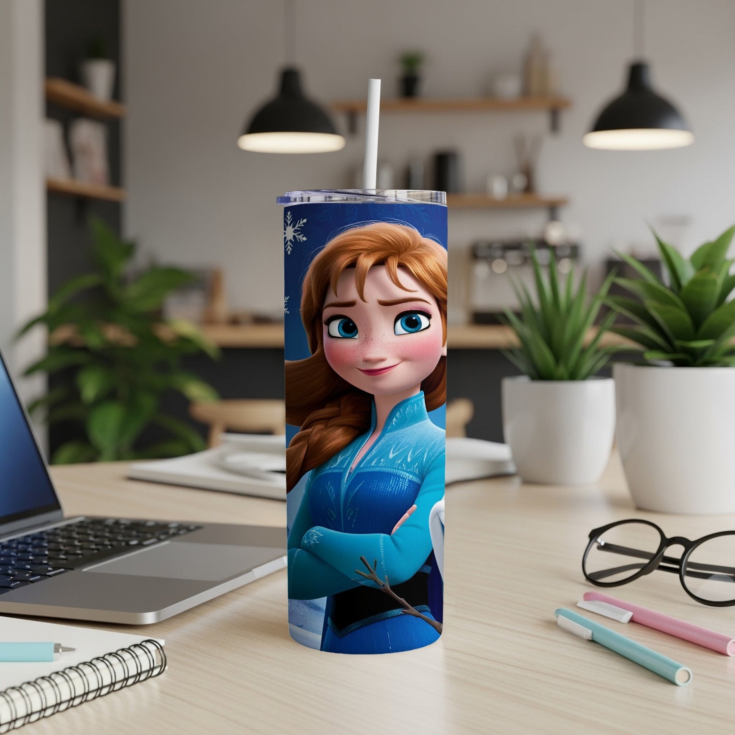 Elsa from Frozen with arms crossed on a blue and white insulated tumbler.