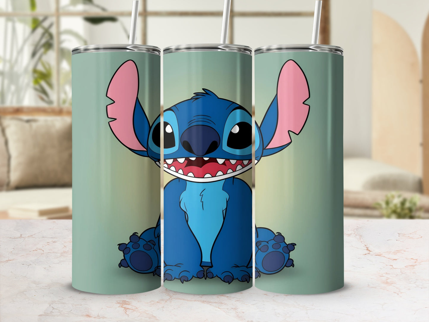 Blue alien character Stitch sitting with straw on a tumbler.