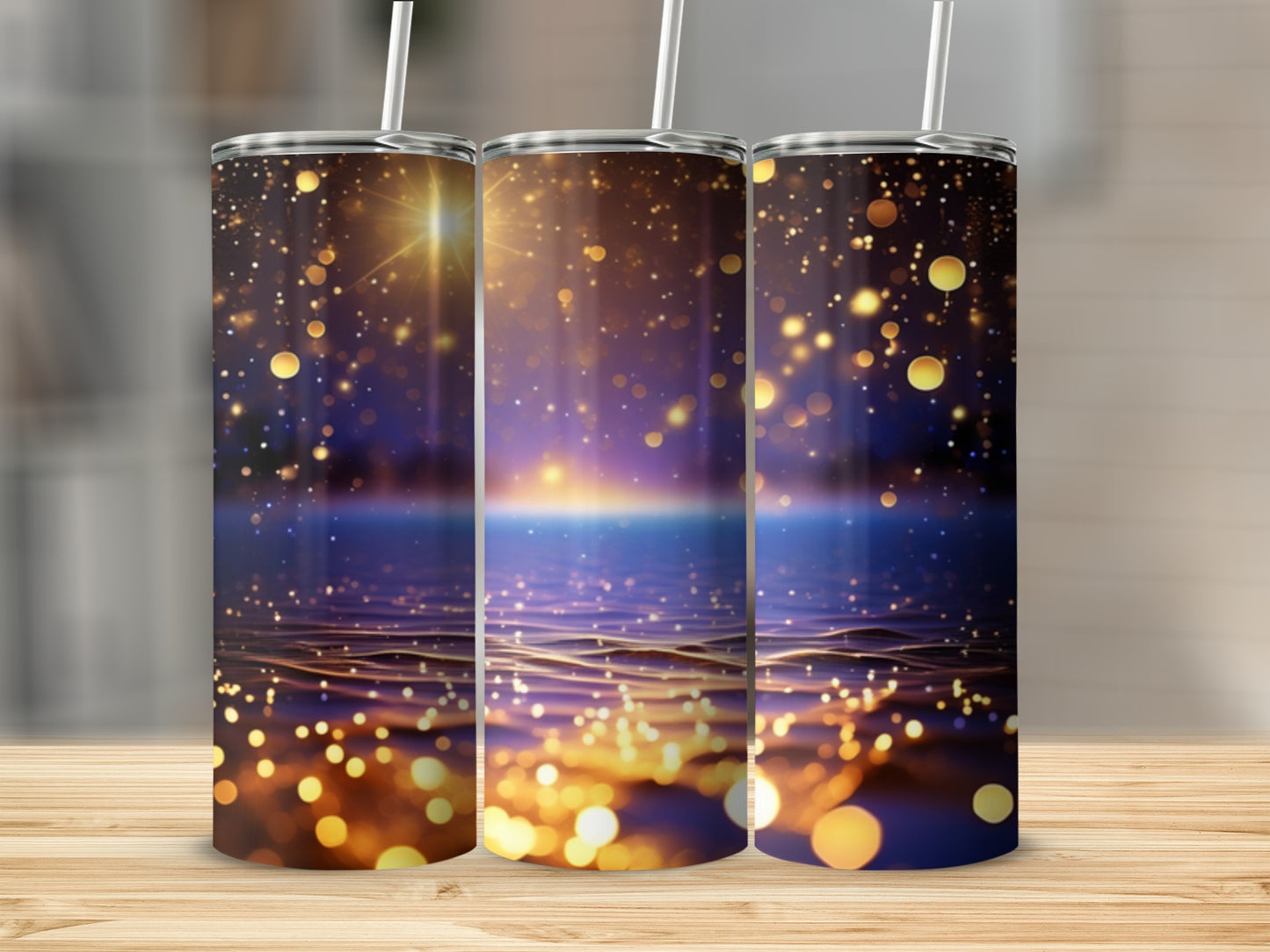 Three tumblers with a glowing, abstract ocean and bokeh light design.