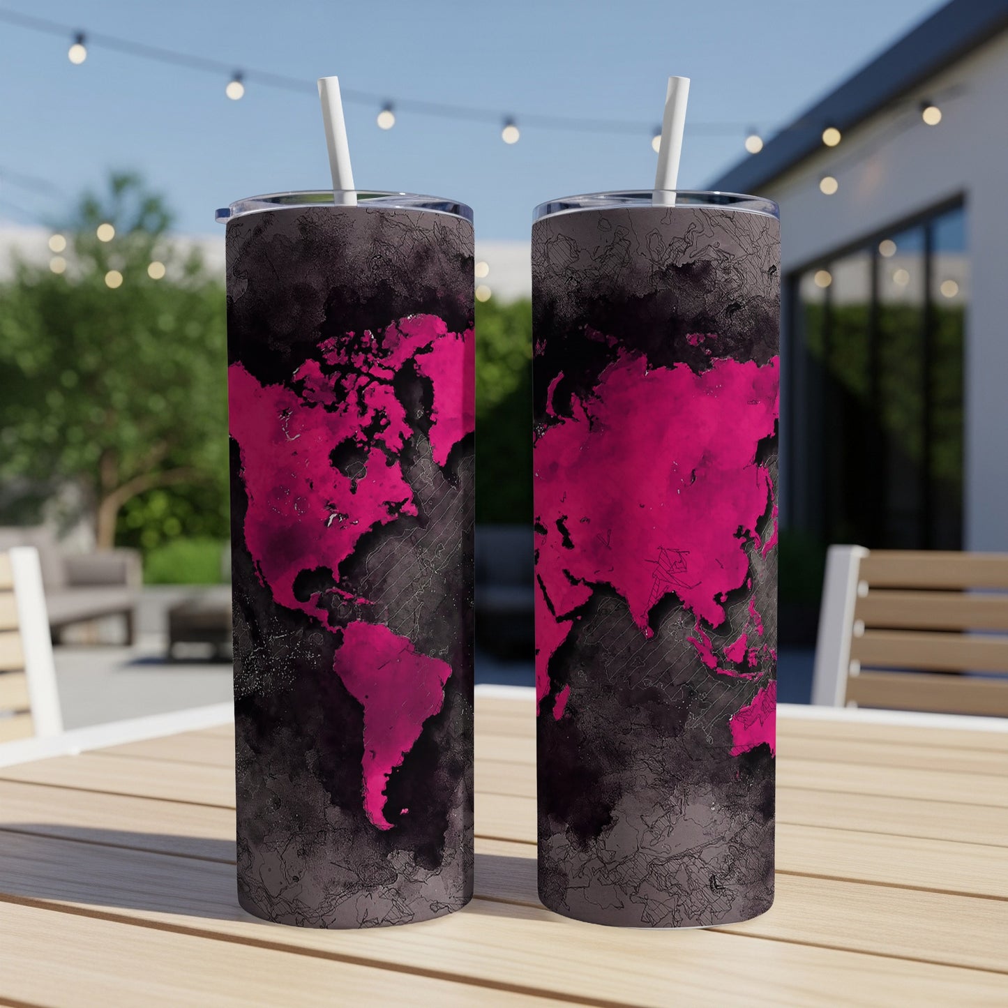 Two tumblers with a pink world map design on a dark textured background.