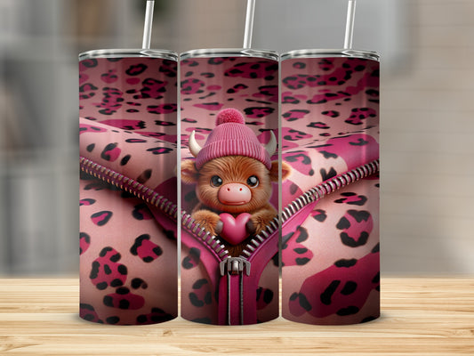 Pink leopard print tumbler with a cute cow wearing a pom-pom hat.