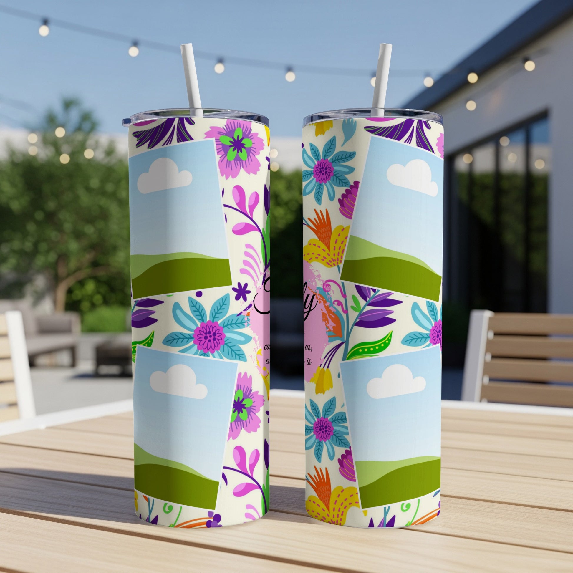 Two tumblers with a collage of colorful flowers, sky, and hills design.