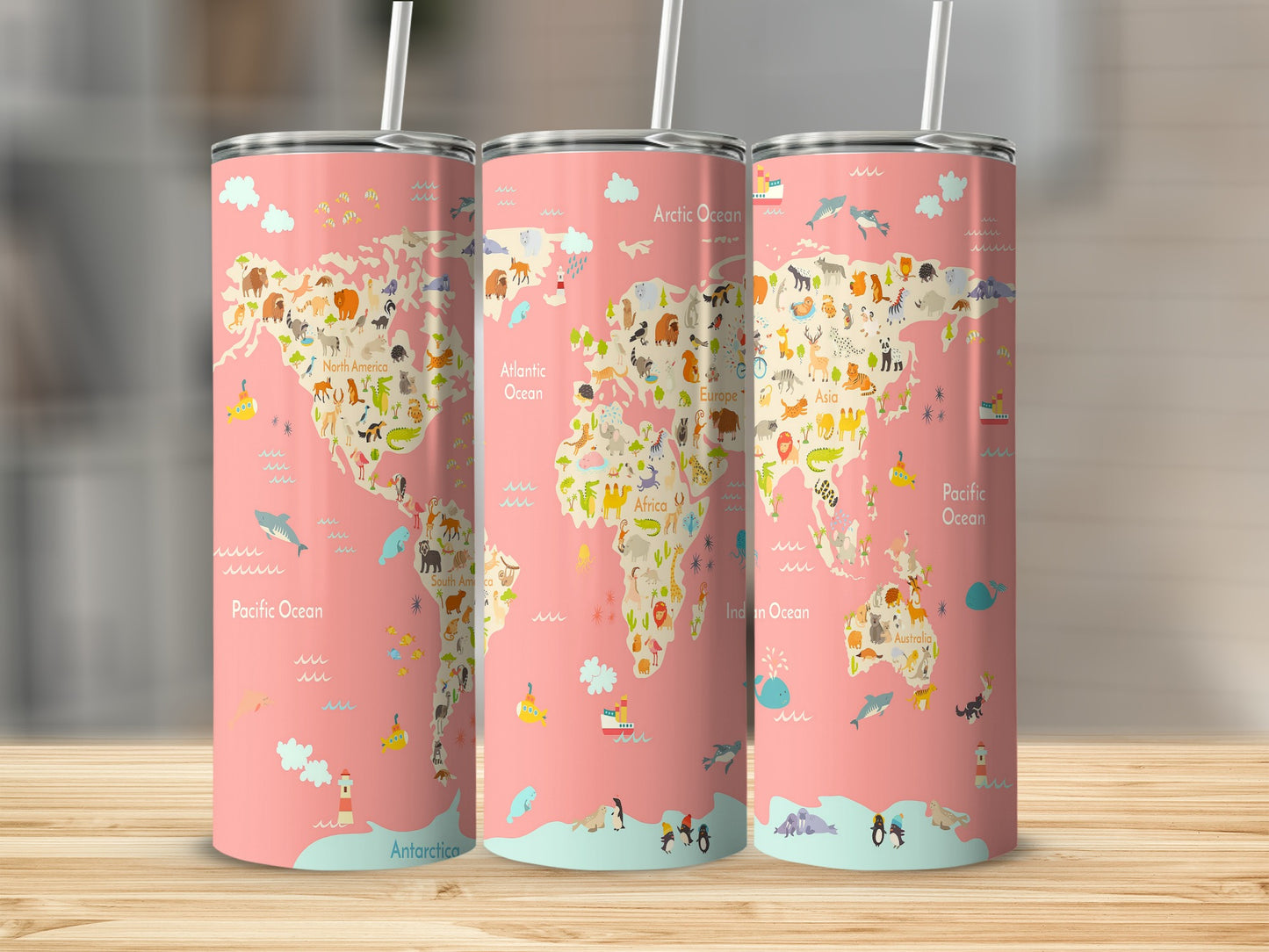 Pink tumblers with a world map design featuring cartoon animals and ocean labels.