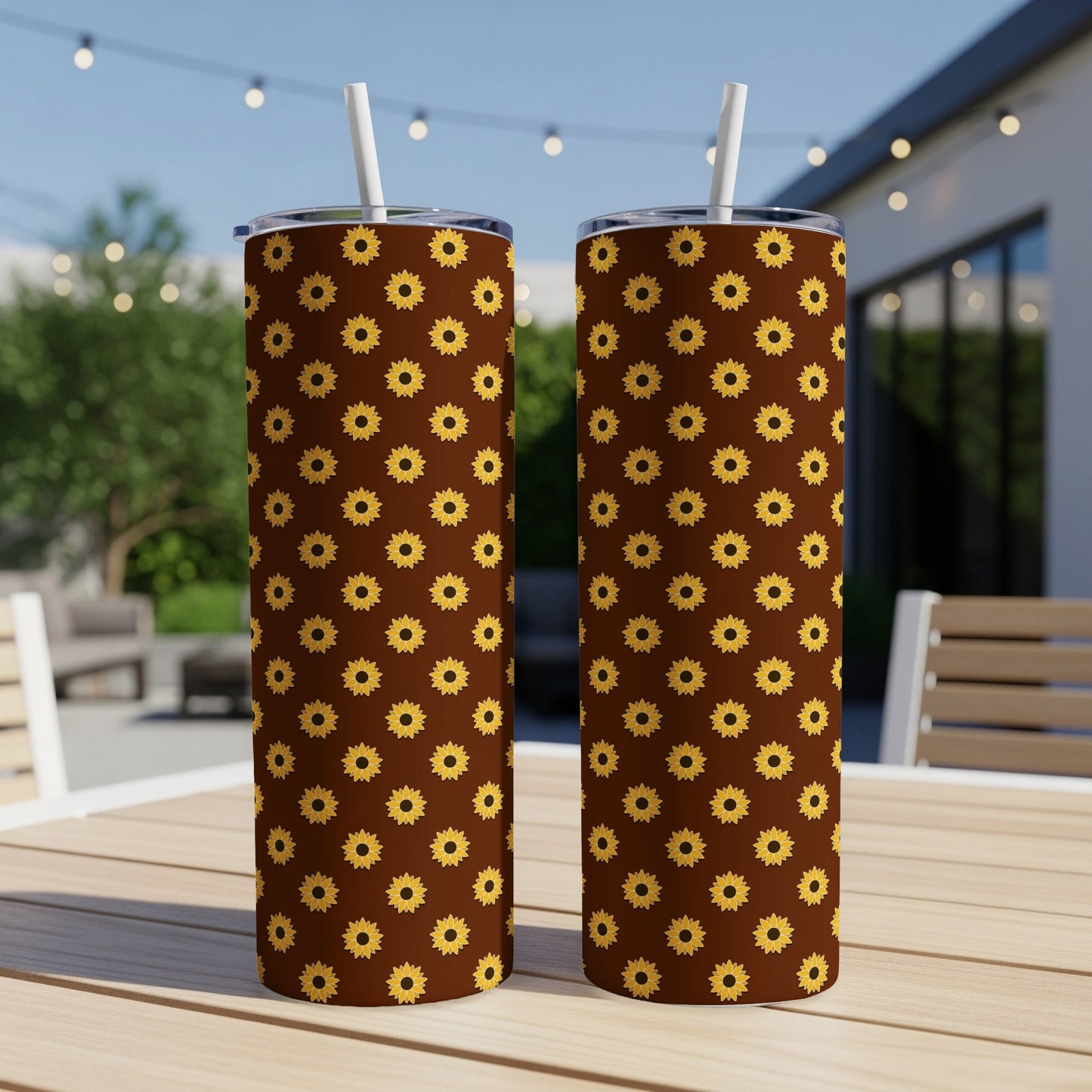 Two tall tumblers with a brown background and a repeating sunflower pattern.