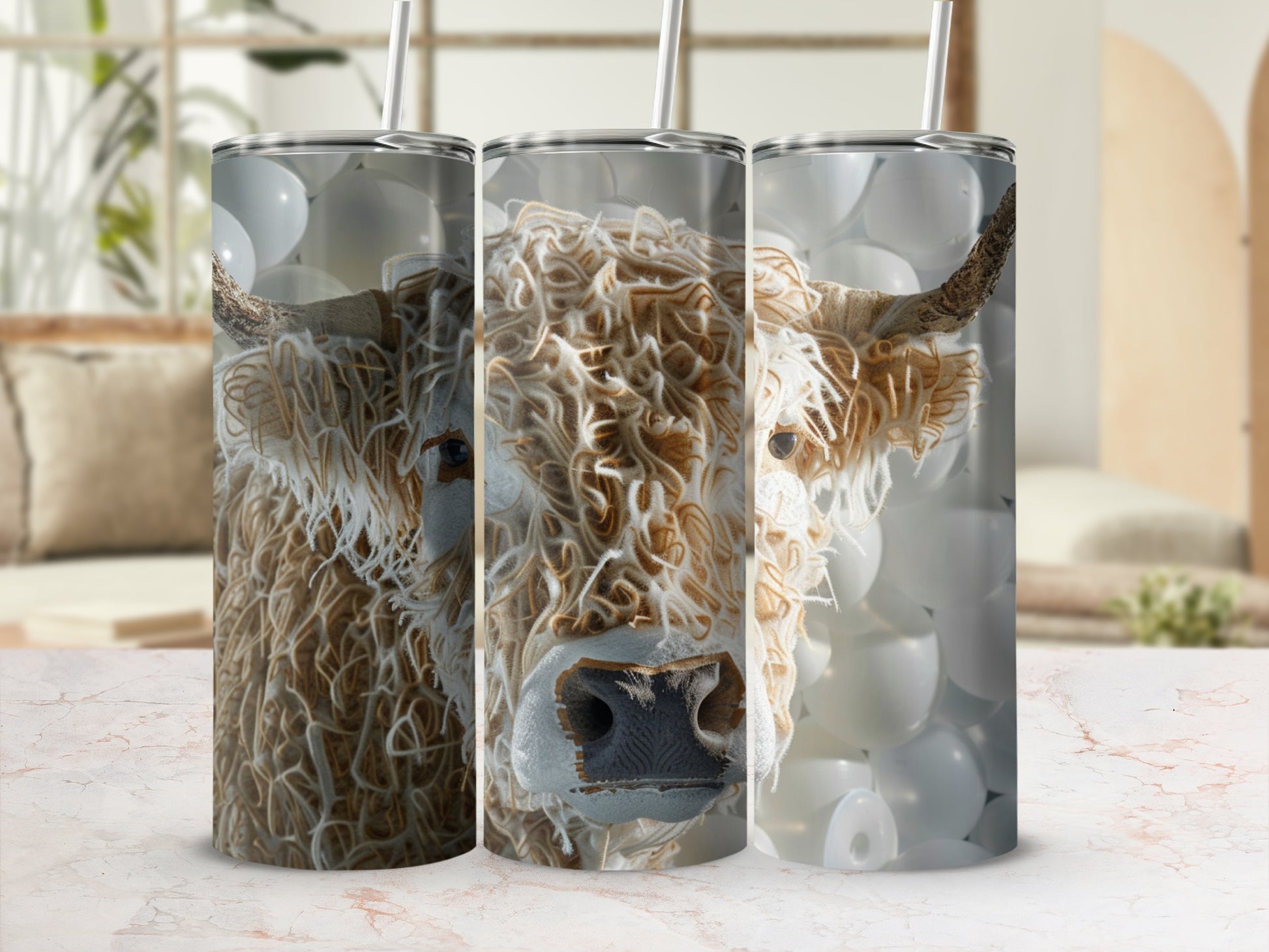 Close-up of a cow's face on a tumbler, surrounded by white balloons.
