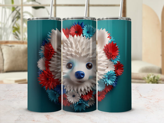 Teal tumbler with fluffy white dog face surrounded by red, white, and blue flowers.