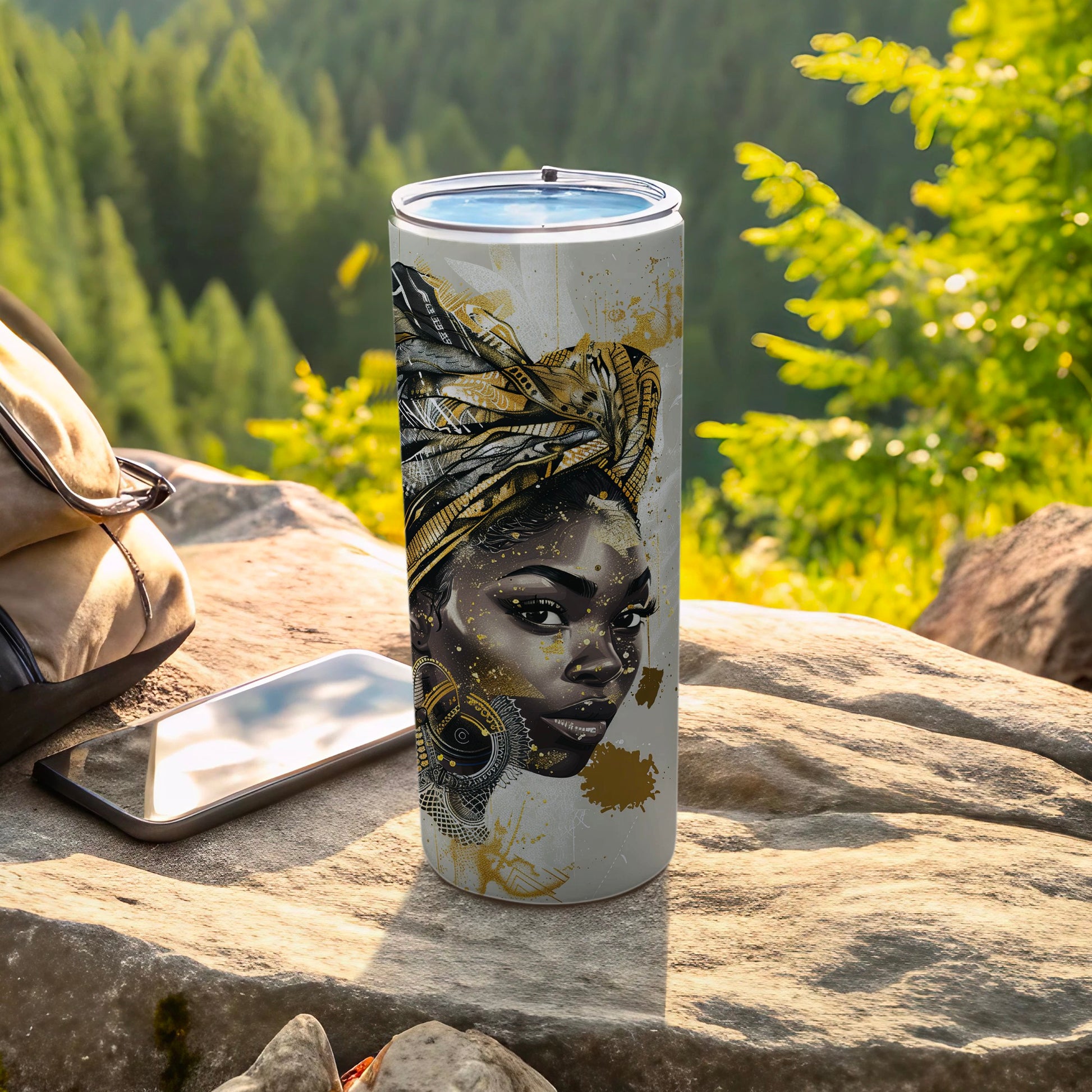 White tumbler with a portrait of a woman wearing a gold turban and earrings.