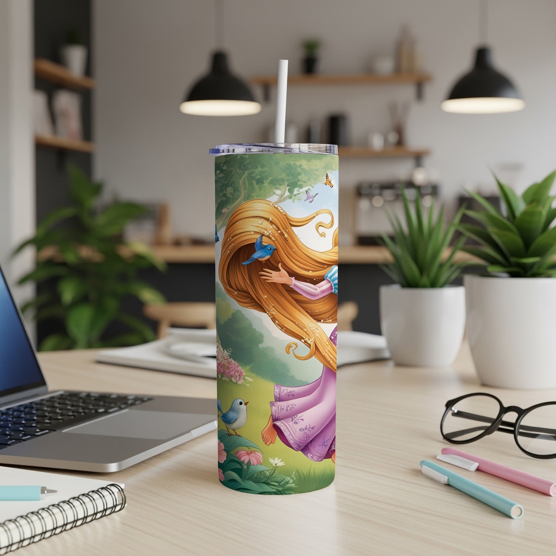 Tangled Rapunzel illustration on a white tumbler with straw on a desk.