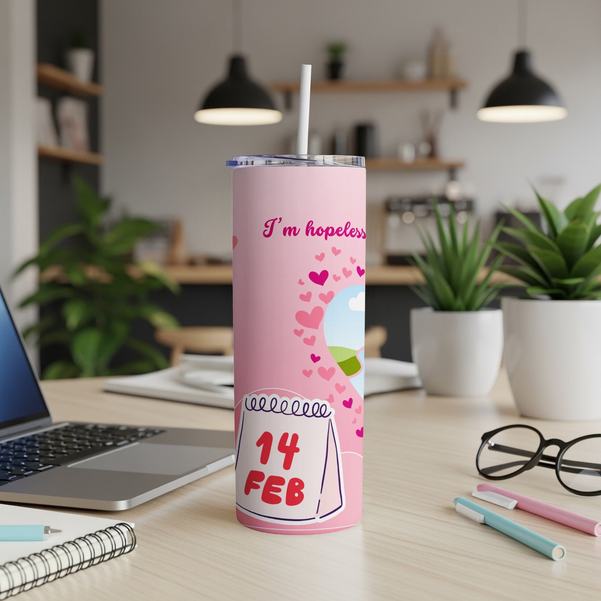 Pink tumbler with hearts, a calendar showing February 14, and the text "I'm hopeless."