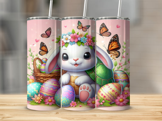 Easter bunny with colorful eggs and butterflies on a tumbler.