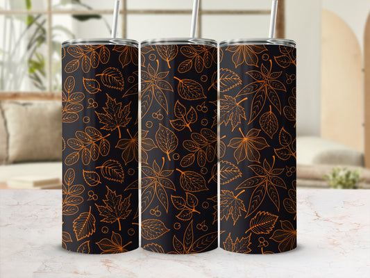 Three tumblers with an orange leaf and cherry pattern on a dark background.