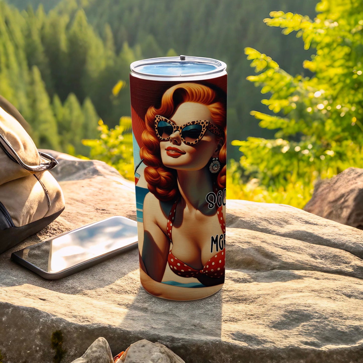 Tumbler with retro pin-up girl illustration in leopard print bikini and sunglasses.