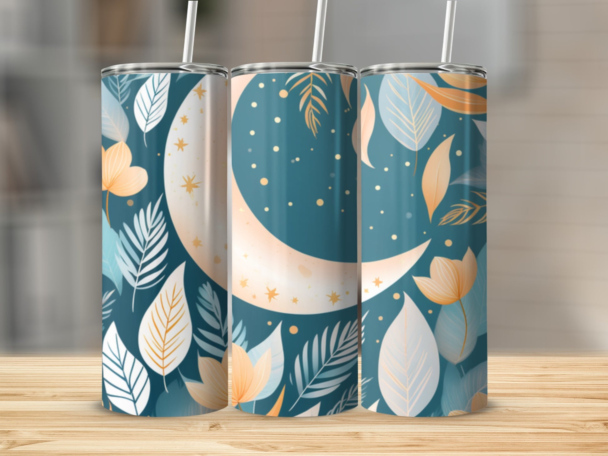 Three tumblers with crescent moon and floral leaf pattern.