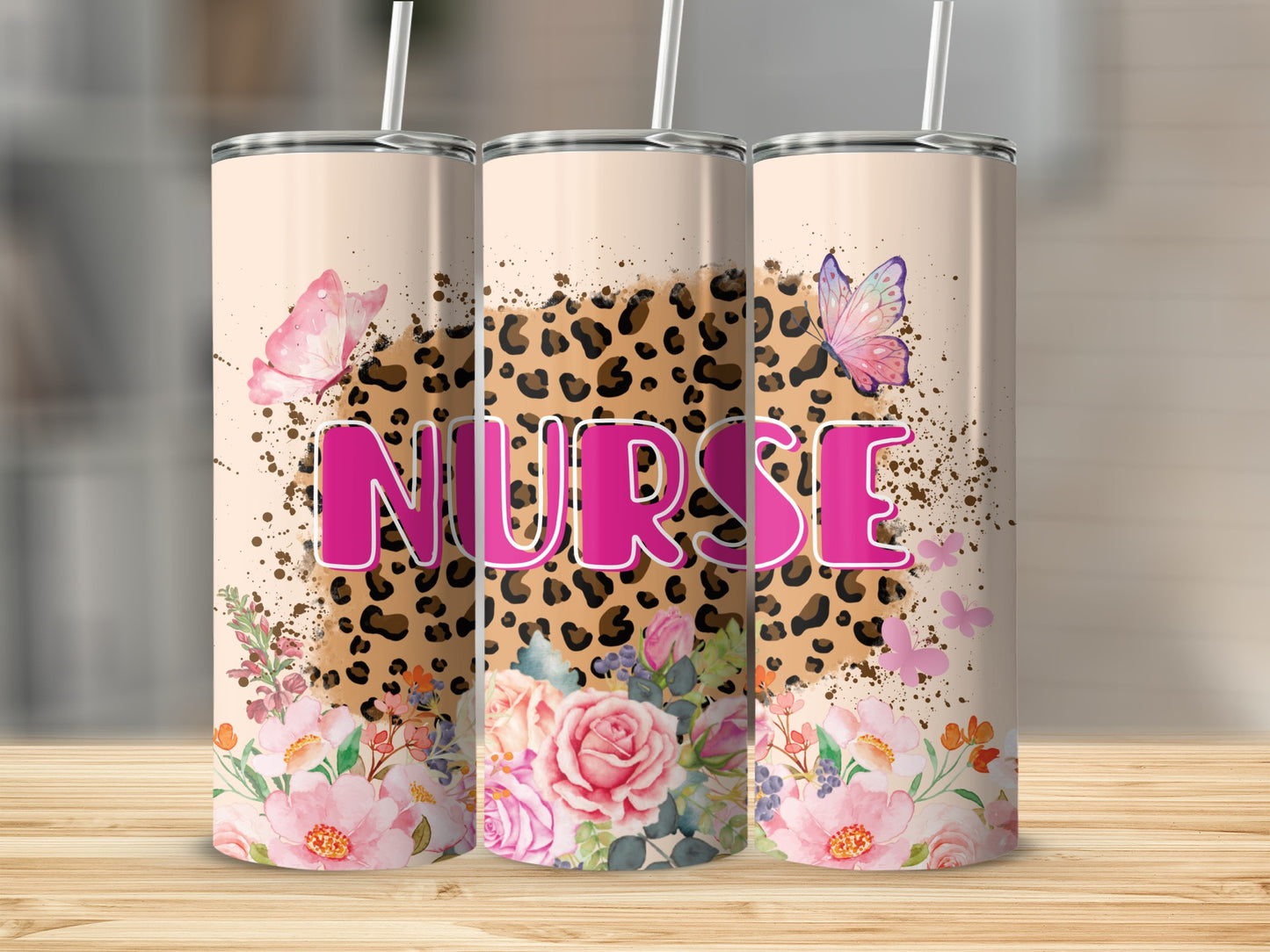 Pink "NURSE" text on leopard print tumbler with flowers and butterflies.