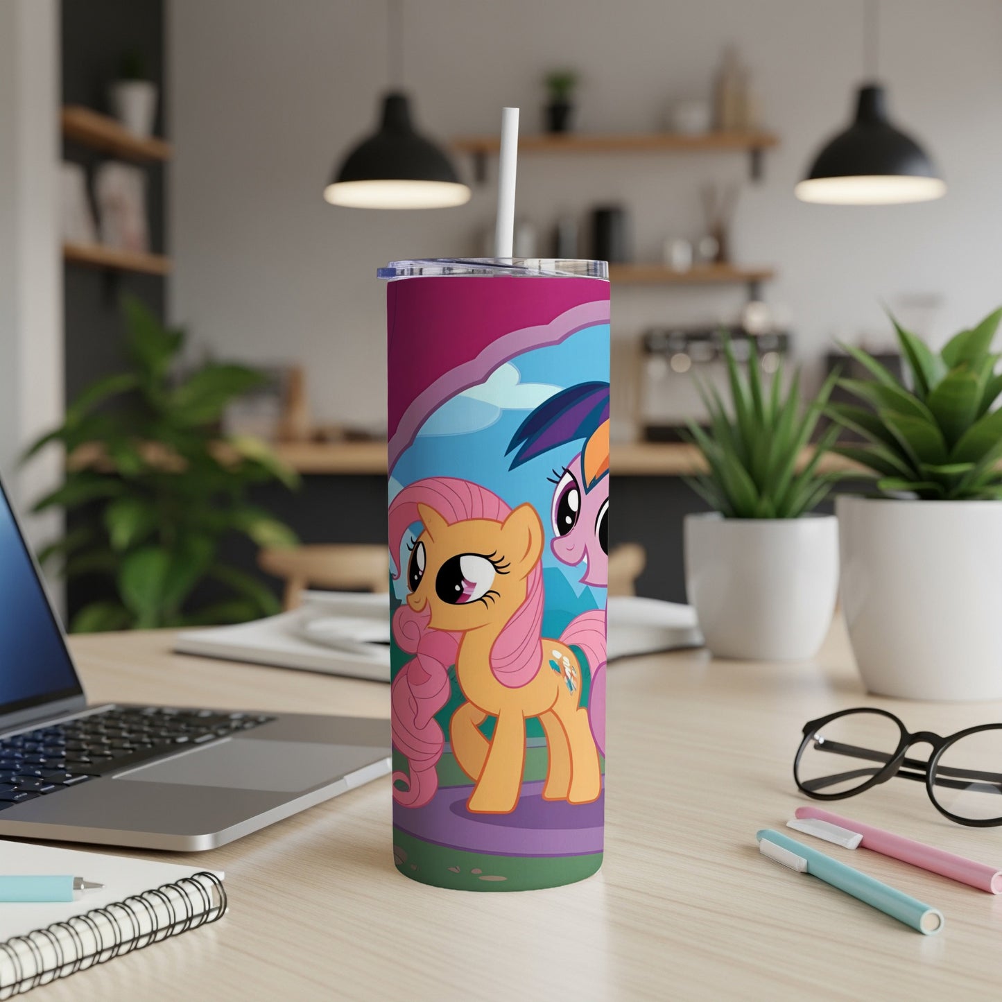 My Little Pony characters on a colorful tumbler with a straw.