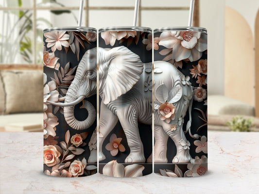 White elephant with floral accents on dark background tumbler.