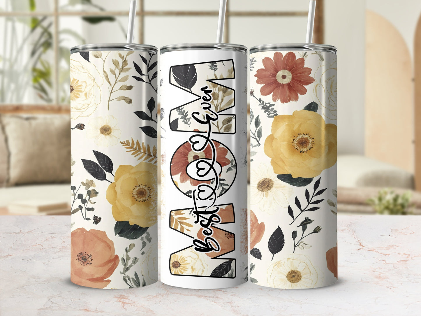 Three tumblers with "Best Mom Ever" in floral lettering, surrounded by flowers.