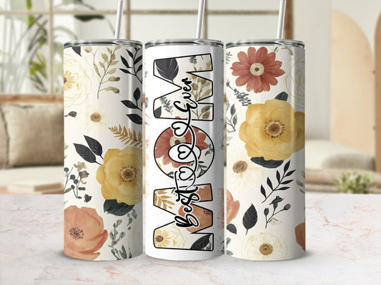 Three tumblers with "Best Mom Ever" in floral lettering, surrounded by flowers.