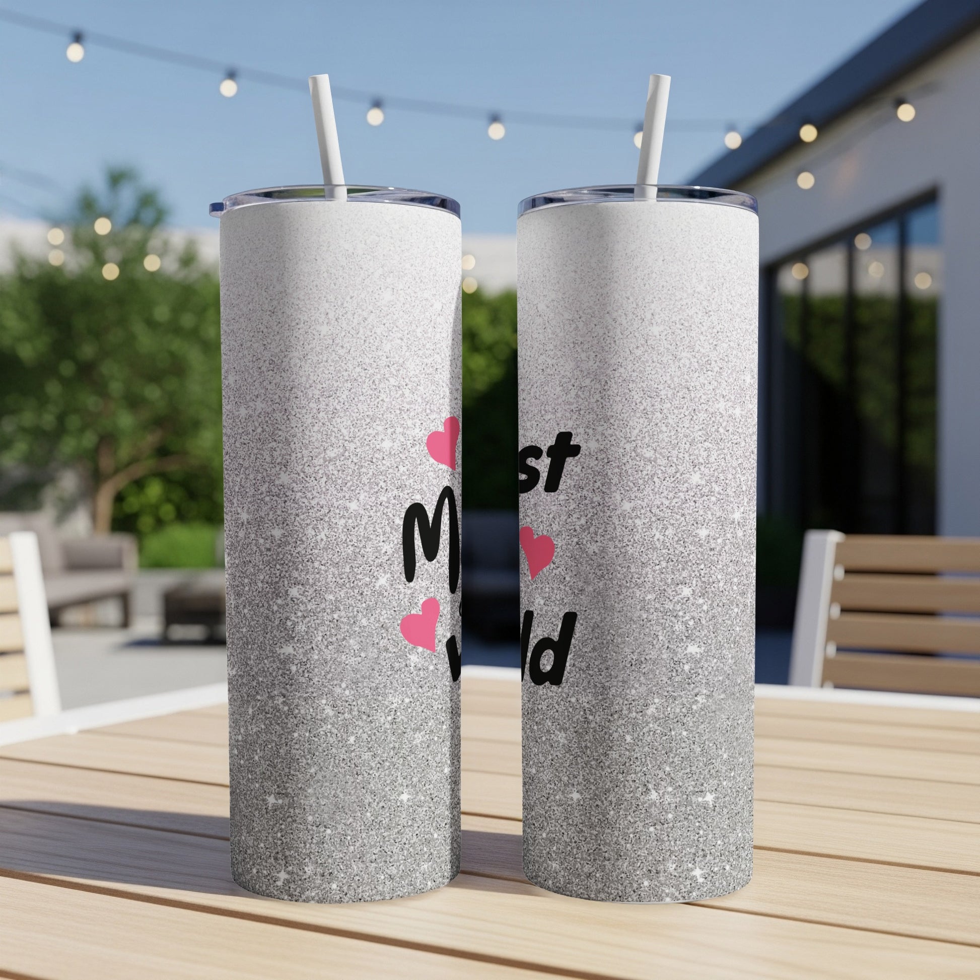 Two tall, slender tumblers with a silver glitter gradient and "Mom" text.