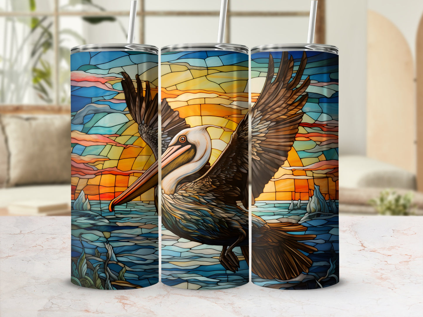 Stained glass tumbler with pelican in flight over ocean at sunset.