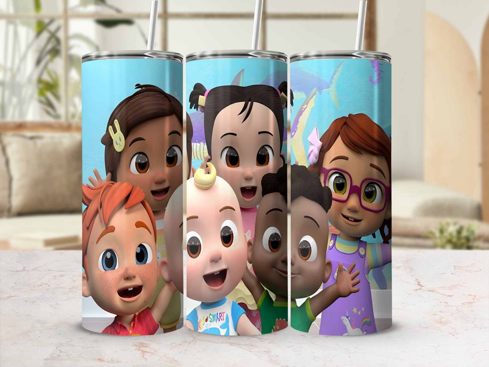 Cocomelon characters on a cylindrical tumbler with straws.