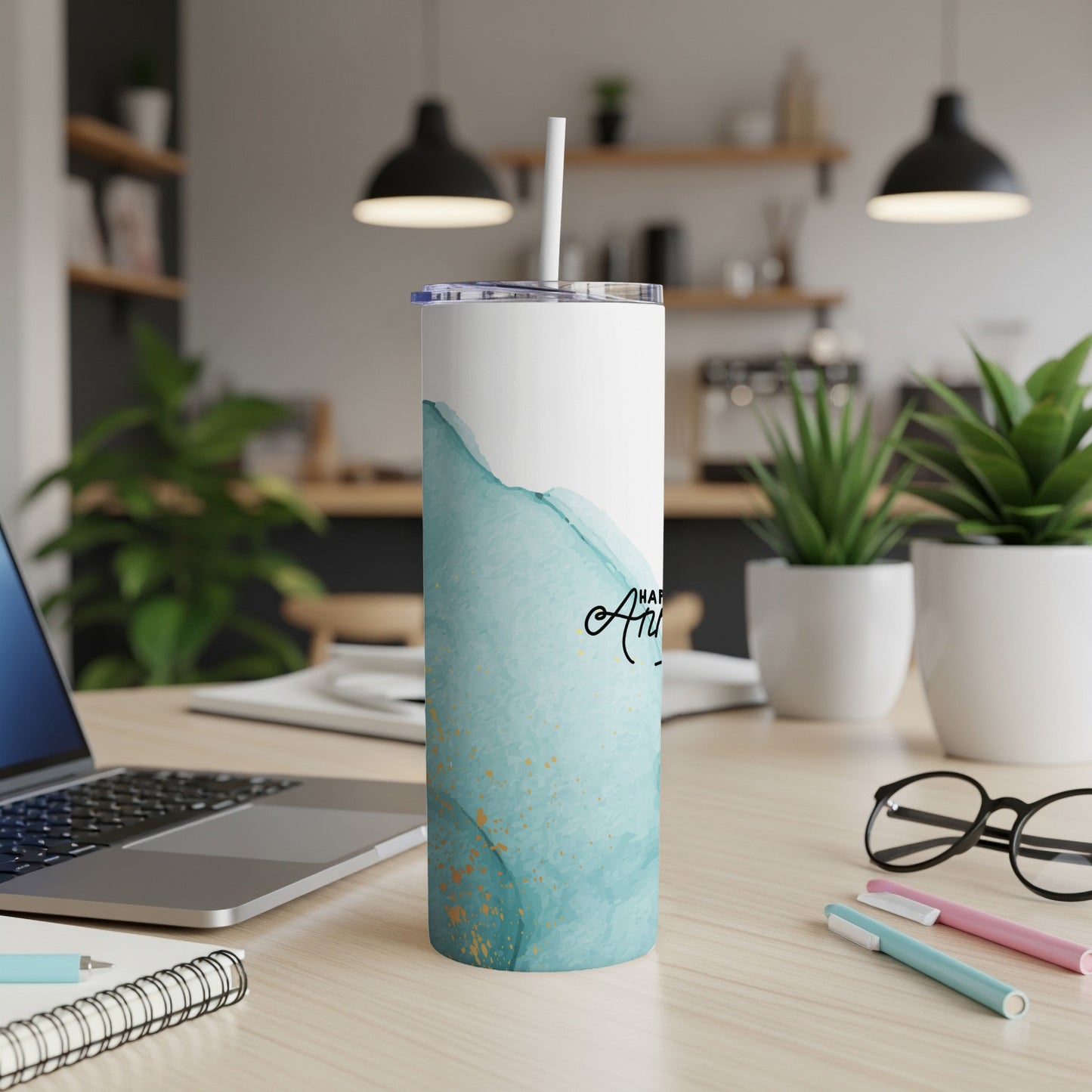 Blue watercolor tumbler with gold flecks and "Happy Anniversary" text.