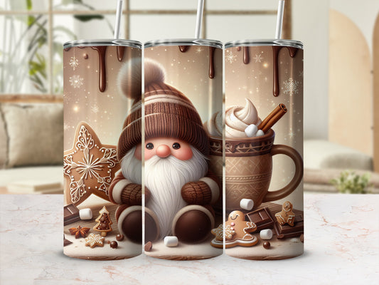 Three Santa-themed tumblers with hot chocolate and gingerbread decorations.