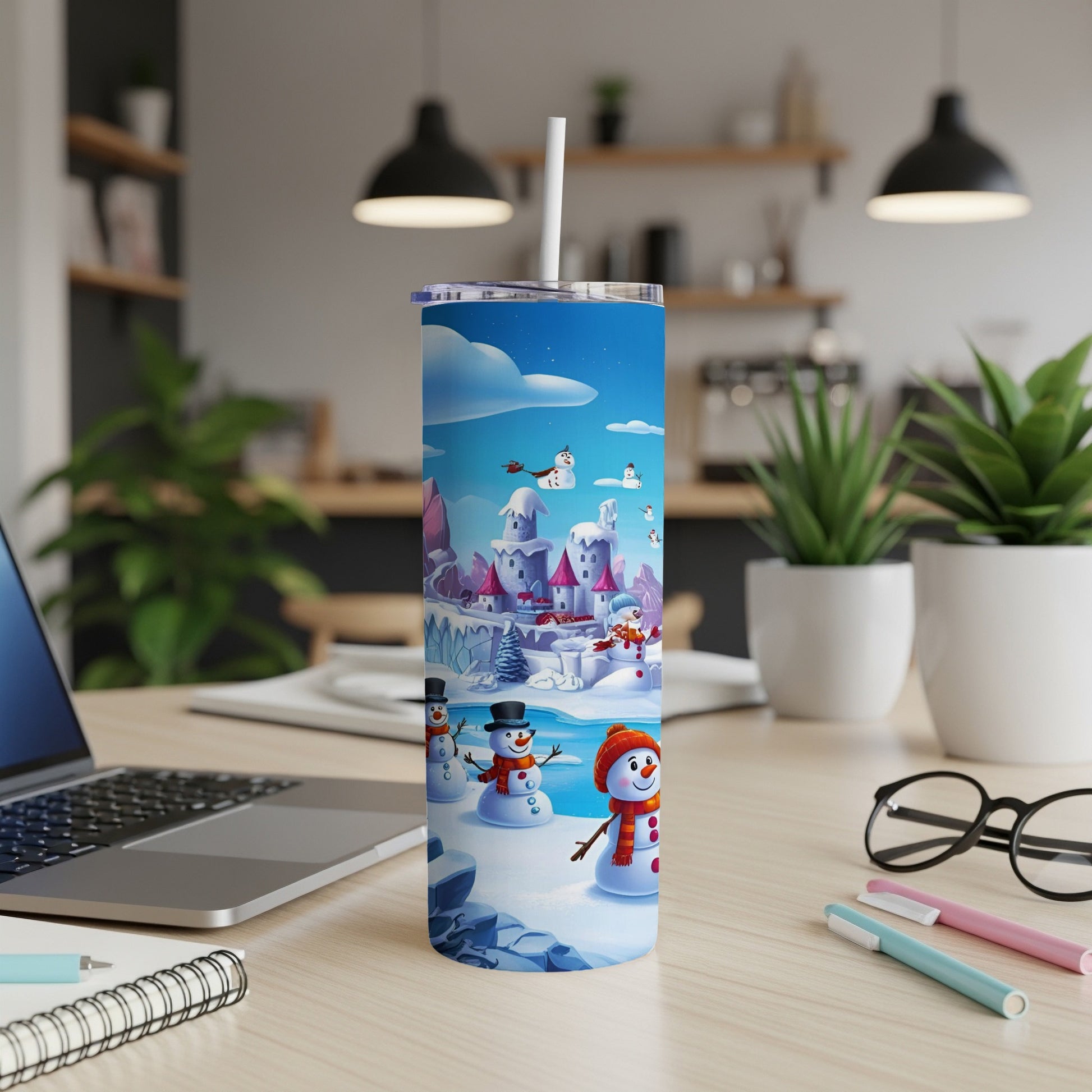 Tumbler featuring cartoon snowmen, castle, and snow-covered landscape.