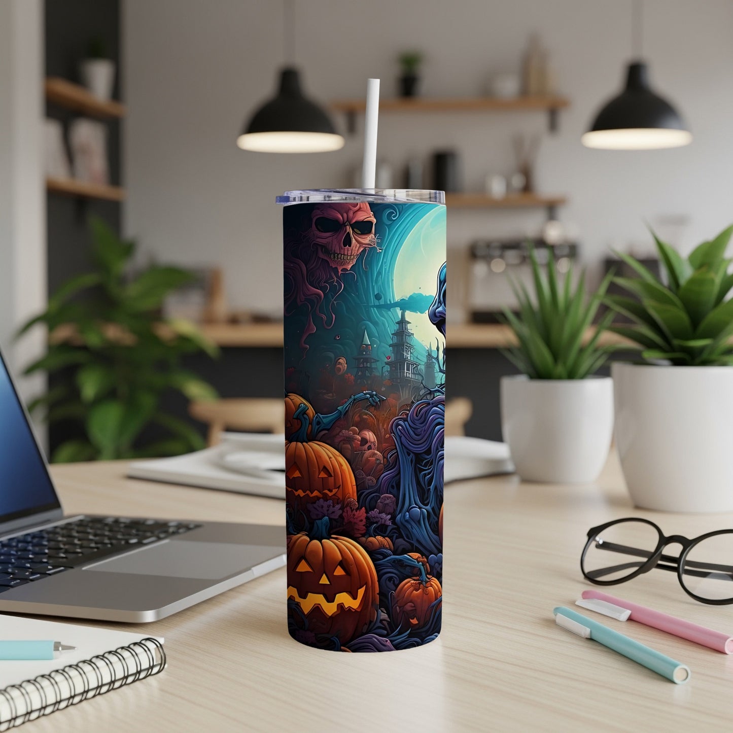 Tumbler with a Halloween scene featuring pumpkins, a skull, and spooky castles.