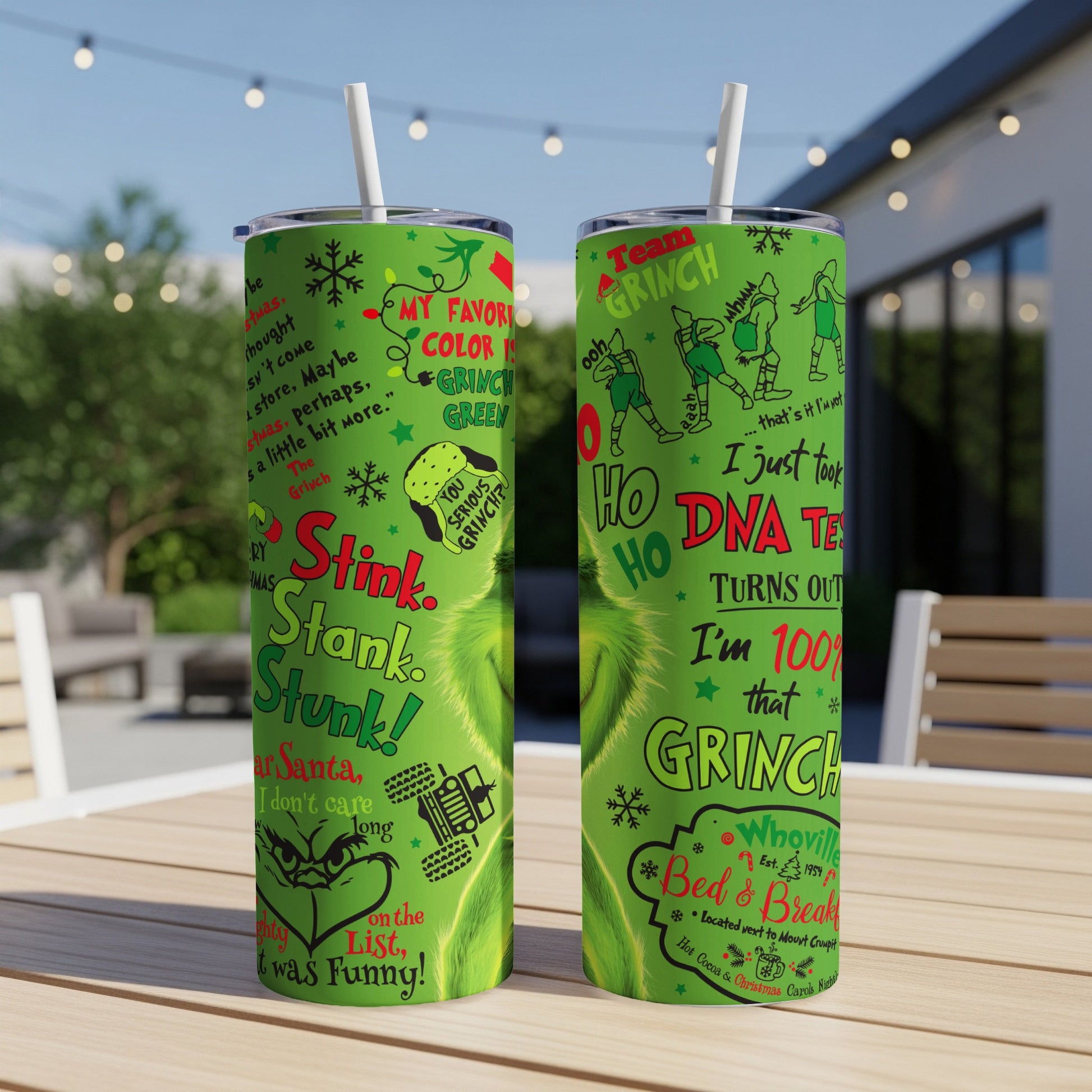 Green Grinch tumbler with "Stink. Stank. Stunk!" and "HO HO HO DNA TEST" text.