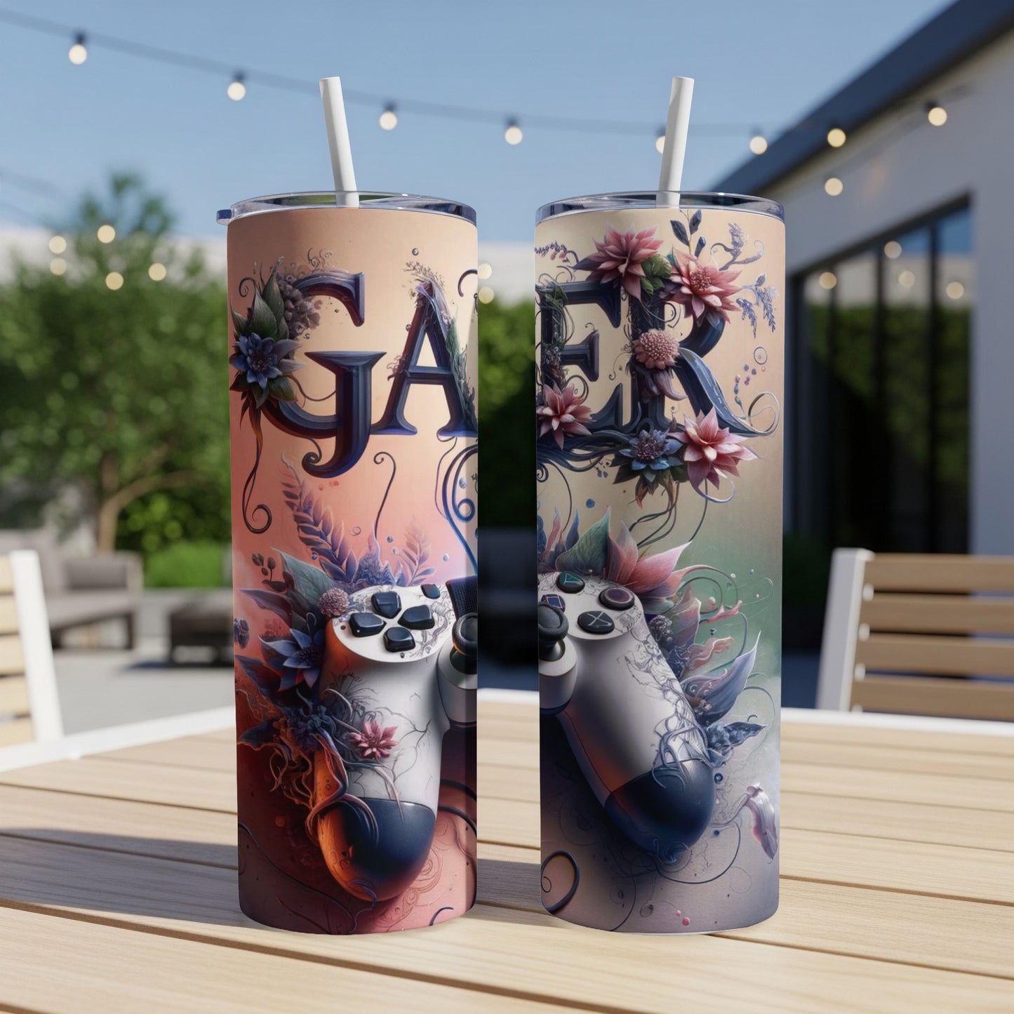 Two tumblers featuring video game controllers adorned with flowers and the word "Gamer."