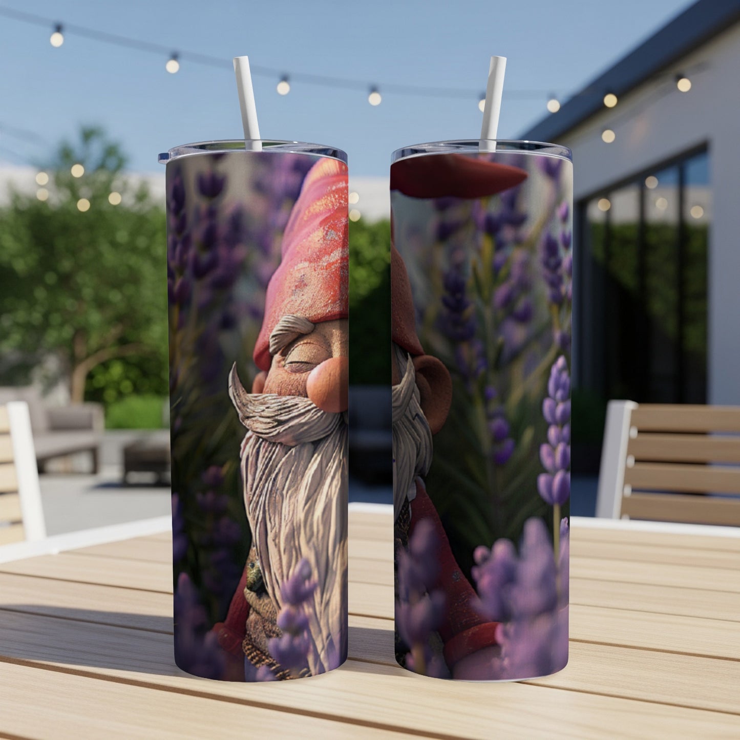 Gnome face and lavender flowers on a dual-sided tumbler with straws.