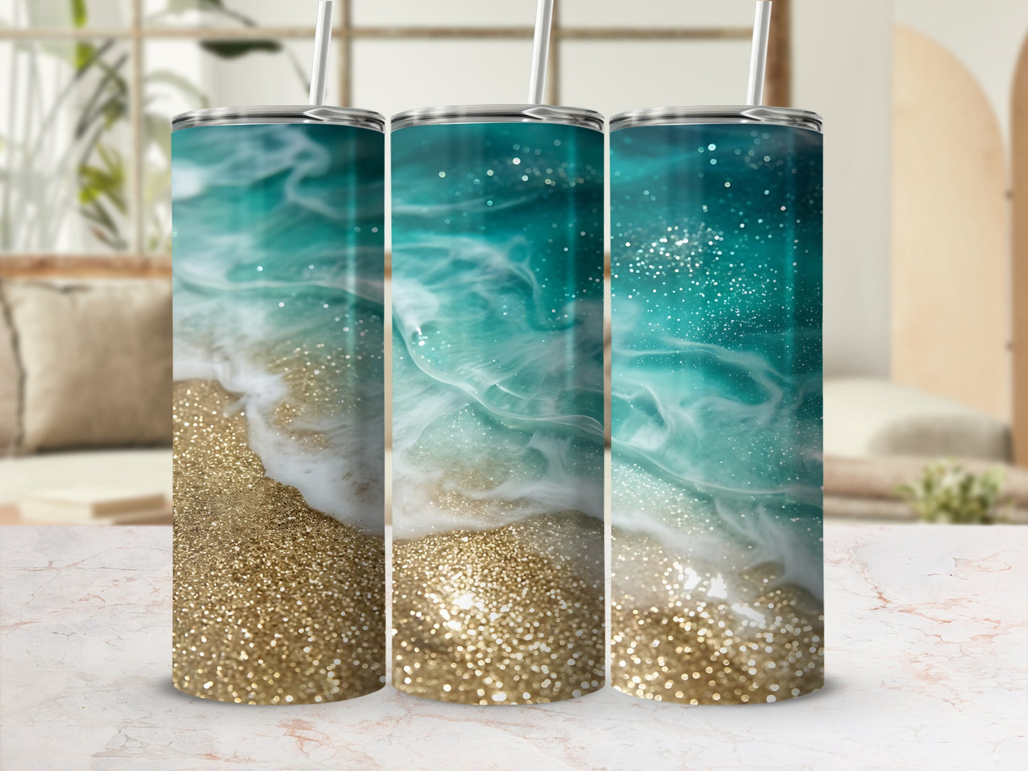 Three tumblers with a sparkly gold beach and ocean wave design.