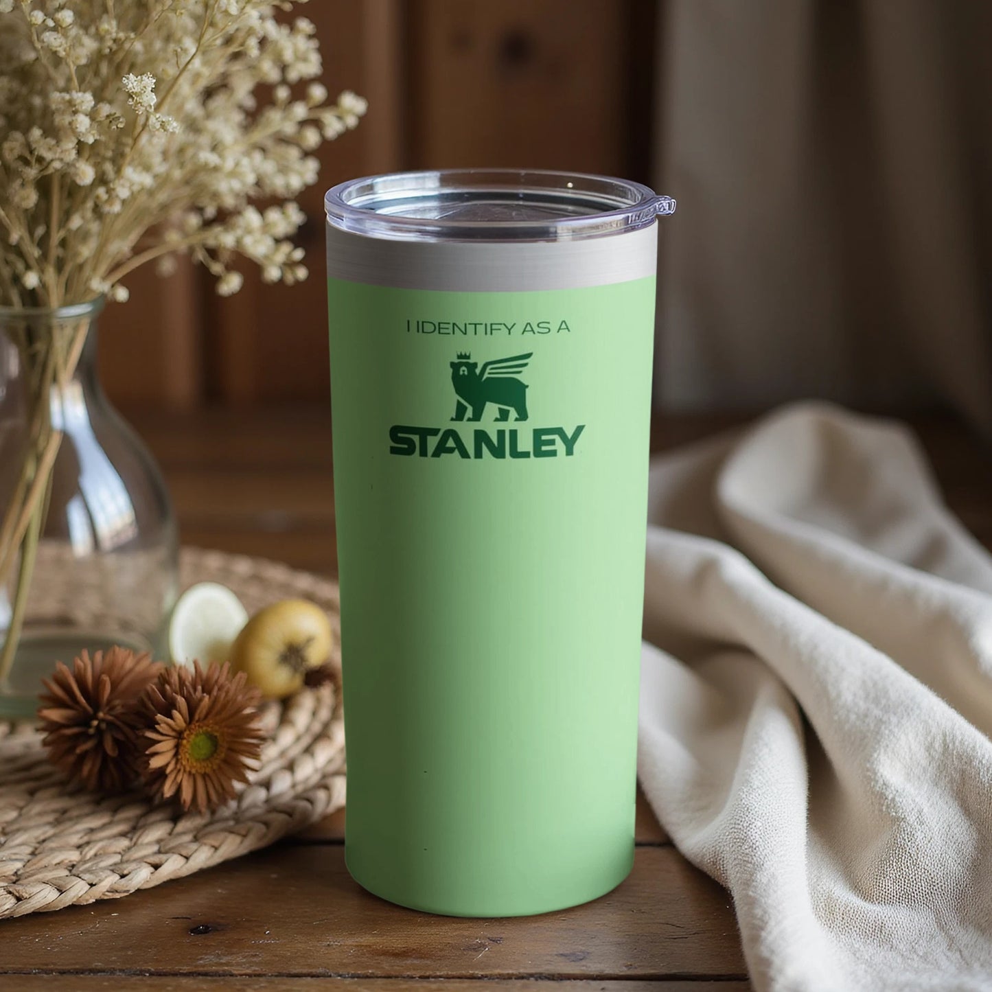 Green Tumbler With I Identify As A Stanley Inscription