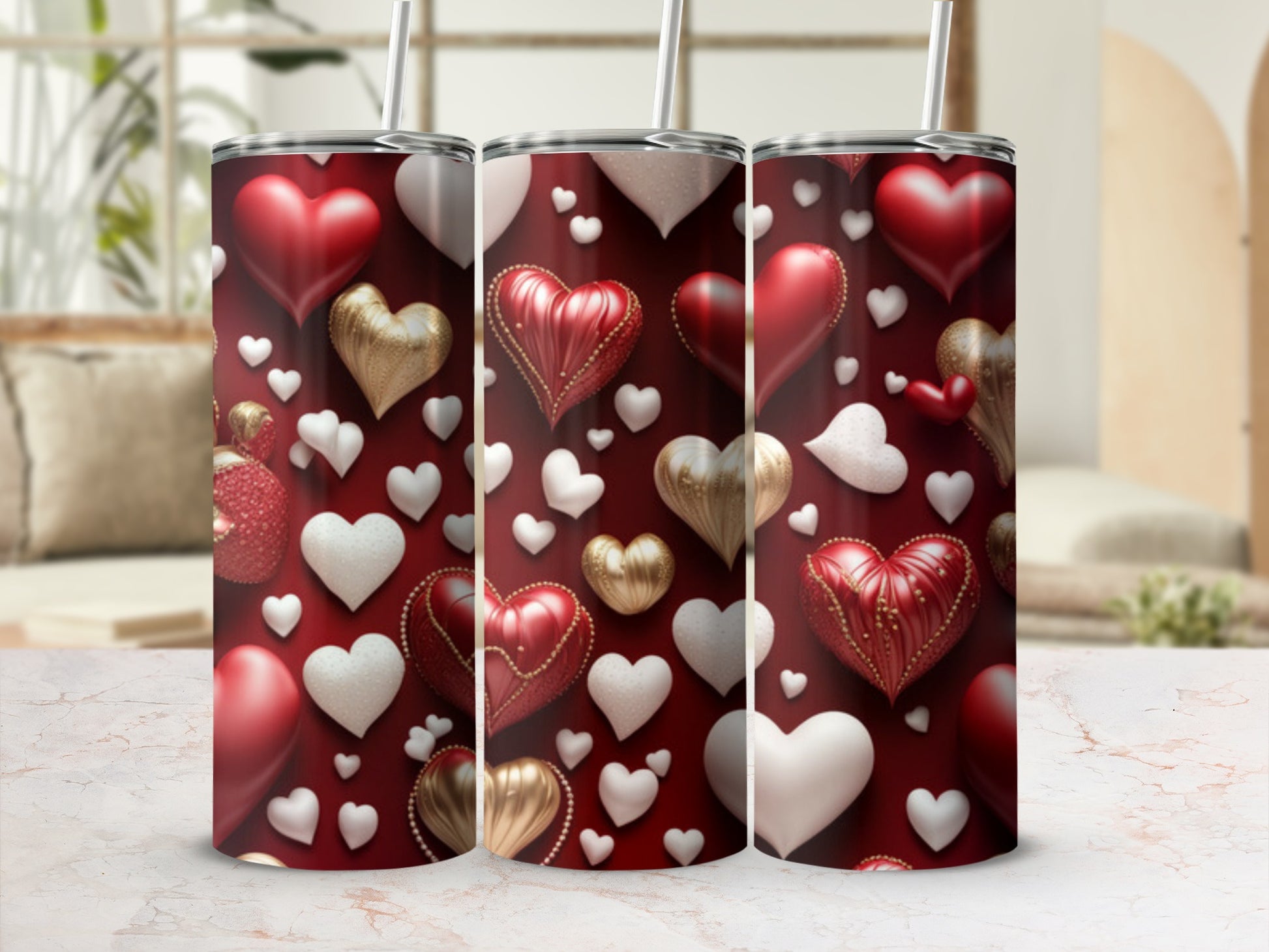 Three red tumblers with a pattern of hearts in red, gold, and white.