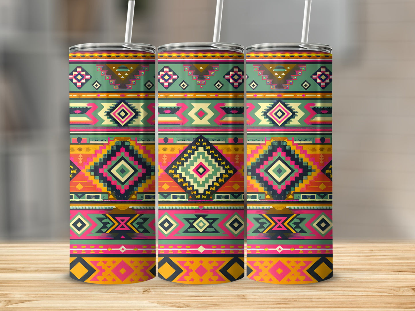 Three tumblers with colorful geometric Southwestern pattern and straws.